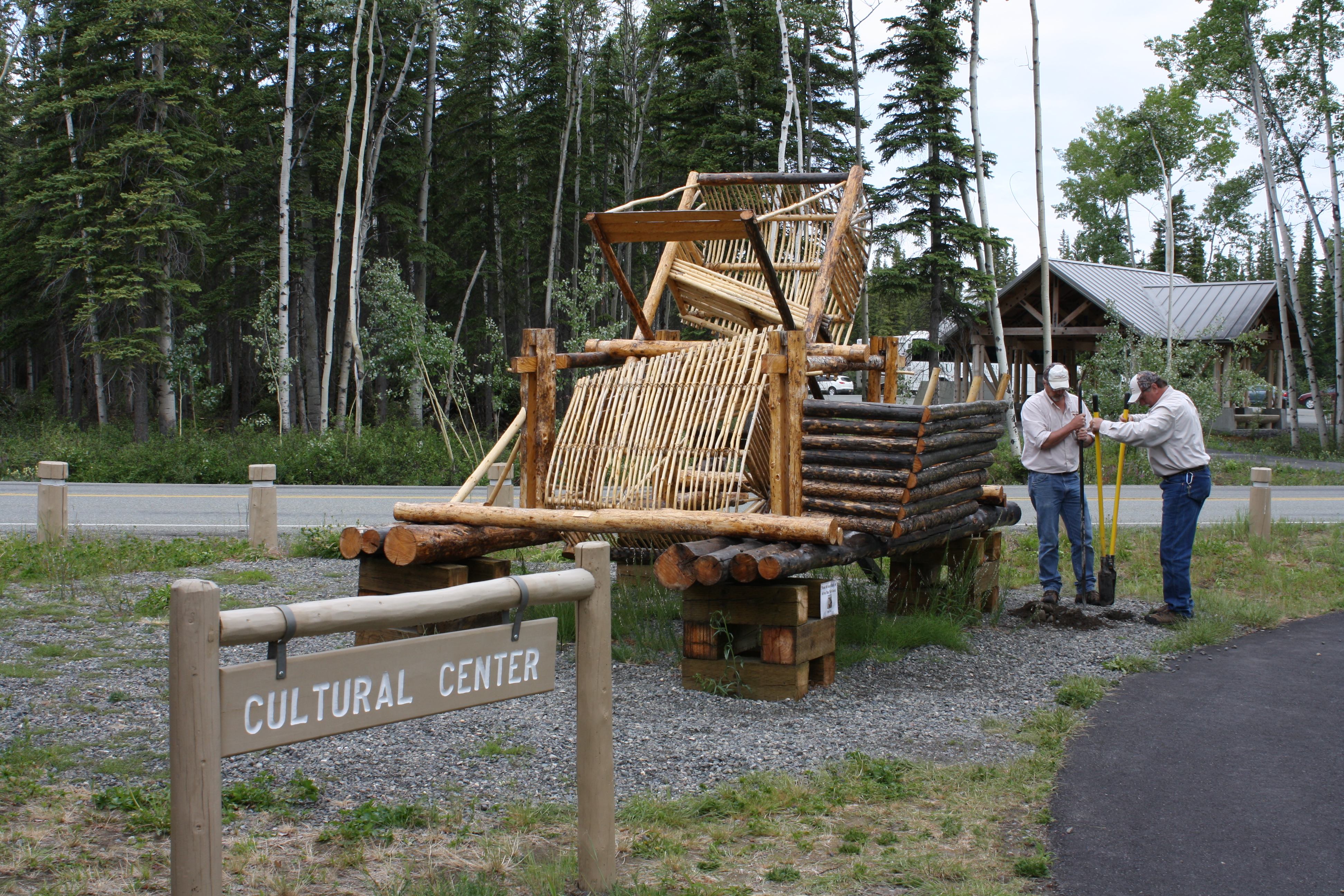 Gregory Sports and Bob Chase of the Copper River Princess Wilderness Lodge's maintenance team work on digging a hole for the new sign in front of the fish wheel. Photo courtesy Princess Lodges. Gregory Sports and Bob Chase of the Copper River Princess Wilderness Lodge's maintenance team work on digging a hole for the new sign in front of the fish wheel.