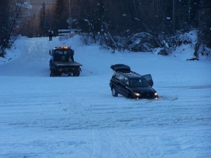 Chena River Ice Bridge Chena River Ice Bridge and two front wheels of a car fallen through the ice.
